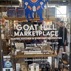 Goat Hill World Market - Hours on the front window
