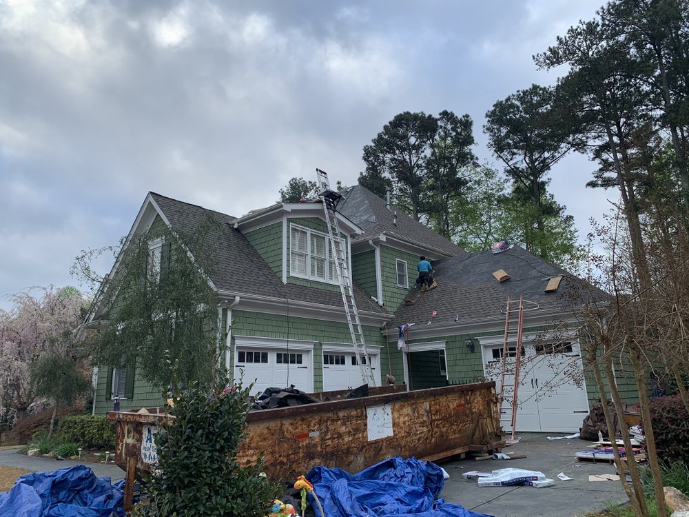 Slide of Noland Roofing