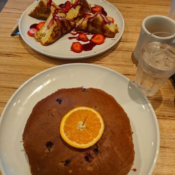 Swamis Cafe - Blueberry multi grain pancakes and cream cheese stuffed strawberry french toast. - Breakfast & Brunch Near Me - Escondido, California Swamis Cafe - Blueberry multi grain pancakes and cream cheese stuffed strawberry french toast. - Breakfast & Brunch Near Me - Escondido, California