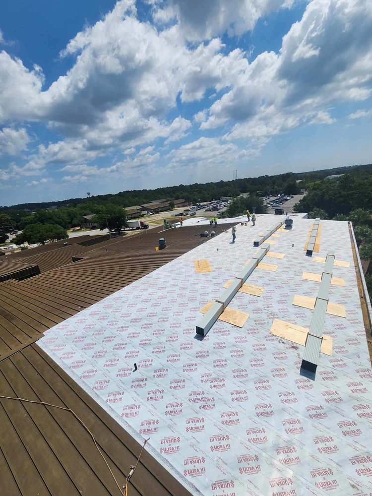 Slide of Freeman Roofing