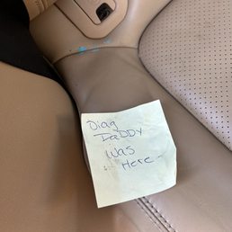 Service department uses some sort of gum/puddy to stick post it note on the back seat of my car. Service department uses some sort of gum/puddy to stick post it note on the back seat of my car.
