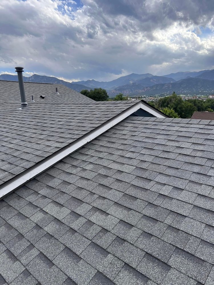 Slide of The Roofing Couple