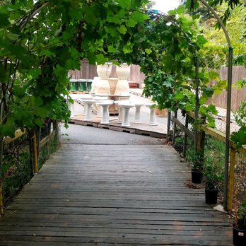 Plant and Pottery Outlet - Returning towards checkout through this beautiful arbor... - Nurseries & Gardening Near Me - Sunol, California Plant and Pottery Outlet - Returning towards checkout through this beautiful arbor... - Nurseries & Gardening Near Me - Sunol, California