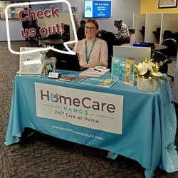 HomeCare Hands - Emily at our HCH Table for Hiring Caregivers!