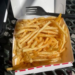 Cheese Fries with shredded cheese.