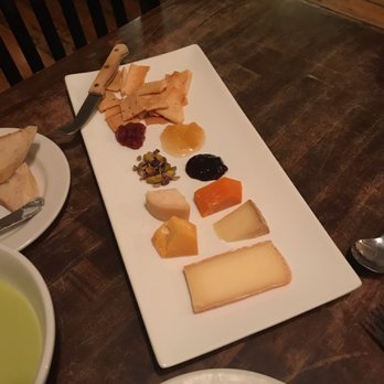 Wren - Cheese plate... incredible crackers. - New American Near Me - Suttons Bay, Michigan Wren - Cheese plate... incredible crackers. - New American Near Me - Suttons Bay, Michigan