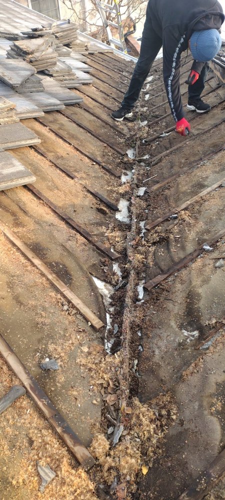 Slide of Echevarria Roofing