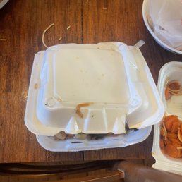 a meal in a styrofoam container