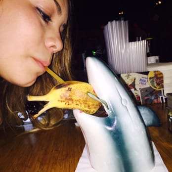 Lei Low - Sippin on a shark eating a dolphin. "Sharks tooth" - Cocktail Bars Near Me - Houston, Texas