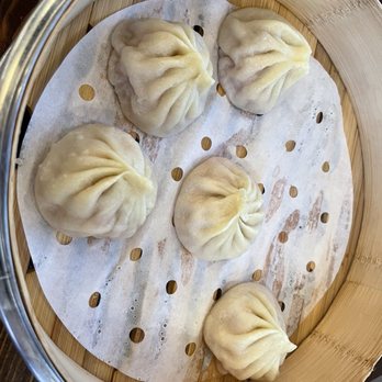 Juicy Dumpling Factory - Xiao long bao (partly eaten) - Chinese Near Me - Cypress, California Juicy Dumpling Factory - Xiao long bao (partly eaten) - Chinese Near Me - Cypress, California