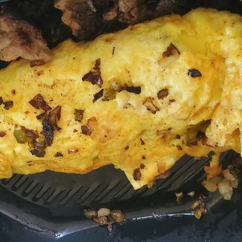 IHOP - Despite the zoomed in appearance, many ingredients were lacking both in and outside of the omelet. - Breakfast & Brunch Near Me - Middletown, Delaware