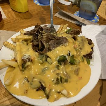 The Gathering Spot - Philly Cheesesteak Fries - Sports Bars Near Me - Alliance, Nebraska The Gathering Spot - Philly Cheesesteak Fries - Sports Bars Near Me - Alliance, Nebraska
