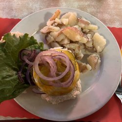 Tessaro's - Cajun burger with a side of boiled red potatoes