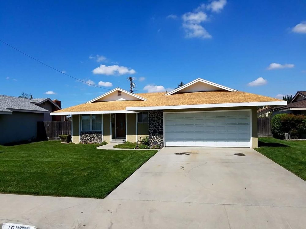 Slide of Roof Pros Roofing