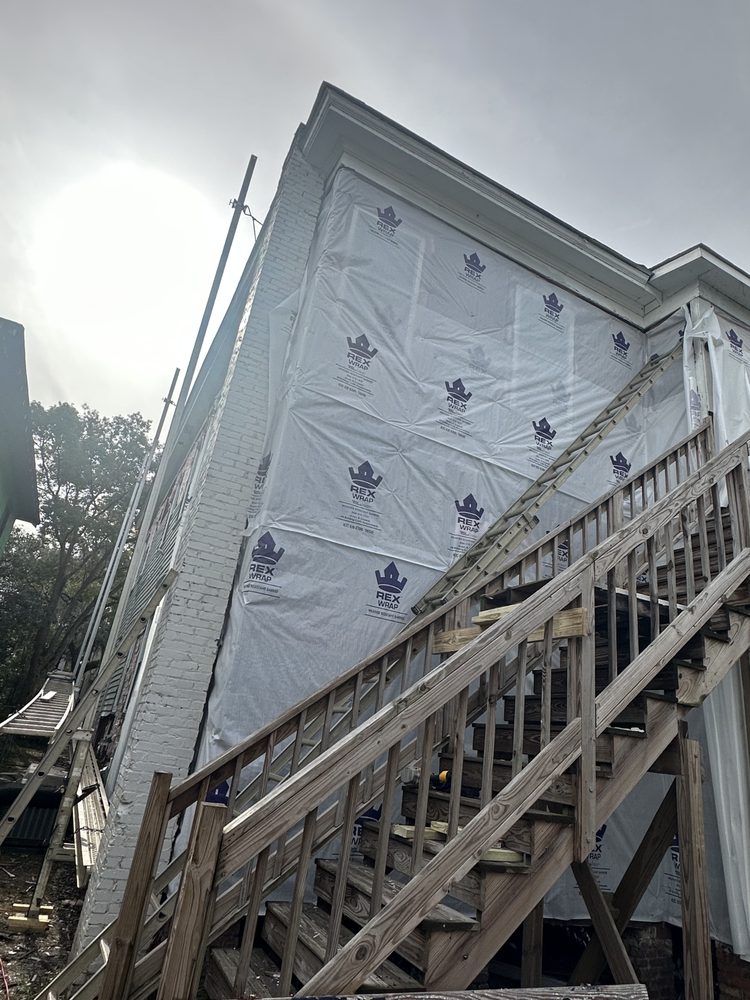 Slide of Landmark Roofing