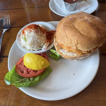 Calypso Restaurant & Raw Bar - My shrimp and scallop burger with side of potato salad - Caribbean Near Me - Pompano Beach, Florida Calypso Restaurant & Raw Bar - My shrimp and scallop burger with side of potato salad - Caribbean Near Me - Pompano Beach, Florida