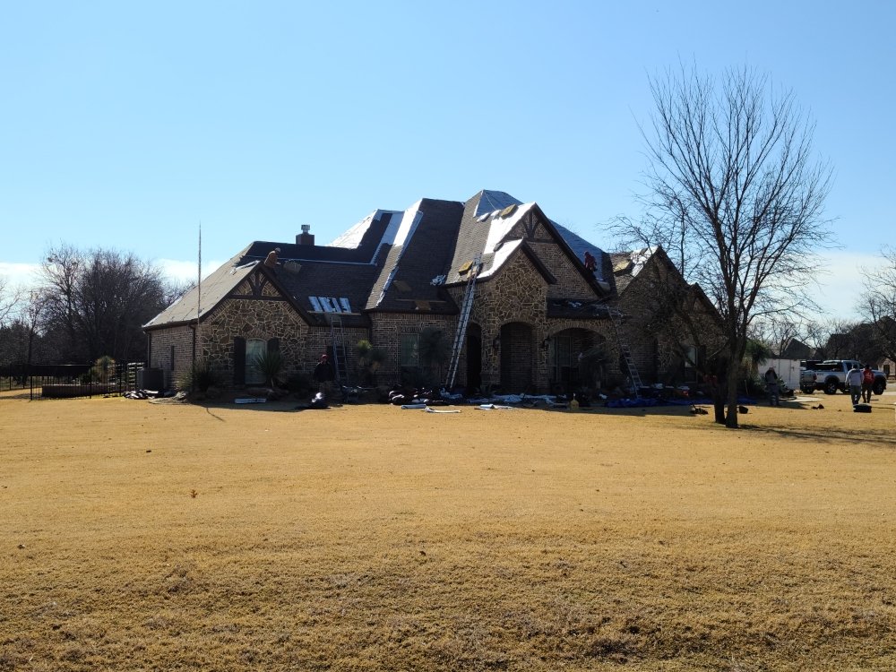 Slide of Kiaas Roofing