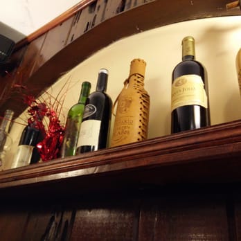 Tango Argentinian Steakhouse - Wine bottles on the wall - Steakhouses Near Me - Central Islip, New York Tango Argentinian Steakhouse - Wine bottles on the wall - Steakhouses Near Me - Central Islip, New York