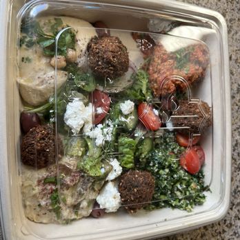 Dish N Dash - Veggie delight with Falafel, hummus, tabouli, babaghanouge, feta, greens, roasted red pepper-walnut dip. - Middle Eastern Near Me - Dublin, California