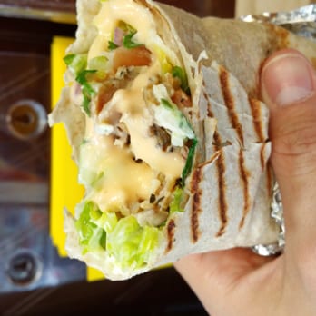 Flame Cafe & Catering - Chicken gyros lavash wrap with creamy garlic sauce - Caterers Near Me Flame Cafe & Catering - Chicken gyros lavash wrap with creamy garlic sauce - Caterers Near Me