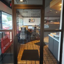Pizza Delight - Front door entrance to the dining area a Pizza Delight in Walkerton Ontario