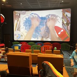 B&B Theatres - Ridgeland Northpark 14 - Loungers, (my feet), toddler play area and screen.