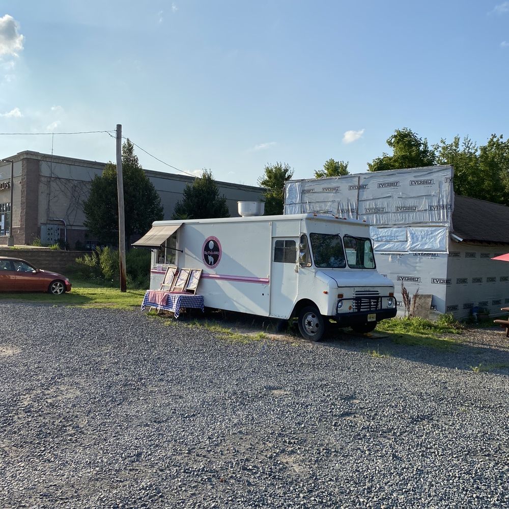 Big Pink's BBQ - a food truck parked in a parking lot - Caterers Near Me - Bridgewater, New Jersey