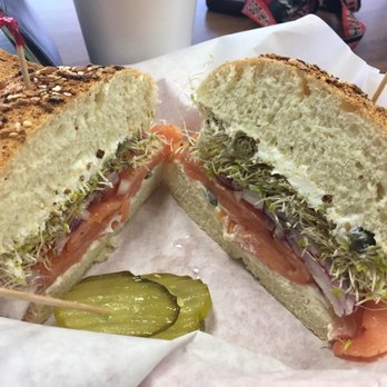 John's Bagel Deli - The New Yorker on an everything bagel (smoked salmon, tomatoes, red onion, capers, cream cheese, sprouts and pickles) - Bagels Near Me - Simi Valley, California