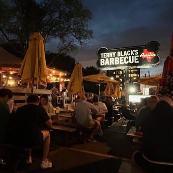 Terry Black's Barbecue - Outdoor patio area at night. - Barbeque Near Me - Austin, Texas Terry Black's Barbecue - Outdoor patio area at night. - Barbeque Near Me - Austin, Texas