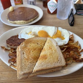 Original Hotcake House - Three eggs/ sausage party and hash browns with toast.  Huge.  That hotcake above was - Diners Near Me - Portland, Oregon