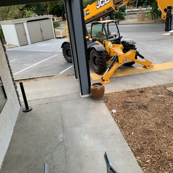 Hilton Garden Inn Davis Downtown - Construction equipment between parking and room - Hotels Near Me - Davis, California Hilton Garden Inn Davis Downtown - Construction equipment between parking and room - Hotels Near Me - Davis, California