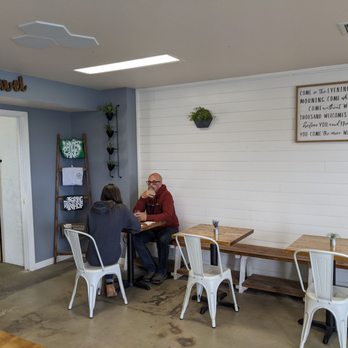 Wandering Hop Wanderlust - a man and a woman sitting at a table - Brewpubs Near Me - Zillah, Washington Wandering Hop Wanderlust - a man and a woman sitting at a table - Brewpubs Near Me - Zillah, Washington