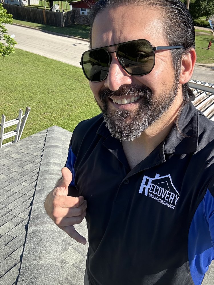 Slide of The Roofing Couple