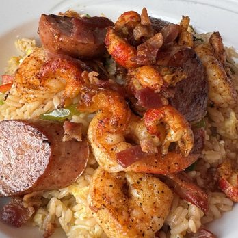 Dirty Cajun Seafood Kitchen - Sausage shrimp and crawfish over rice - Cajun/Creole Near Me - Bedford, Texas