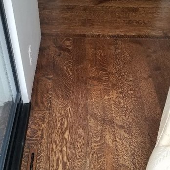 Oshkosh Hardwood Flooring - 2 1/4, 3 1/4, 5 inch quartered and rift white oak with a medium brown stain - Flooring Near Me - Arvada, Colorado Oshkosh Hardwood Flooring - 2 1/4, 3 1/4, 5 inch quartered and rift white oak with a medium brown stain - Flooring Near Me - Arvada, Colorado