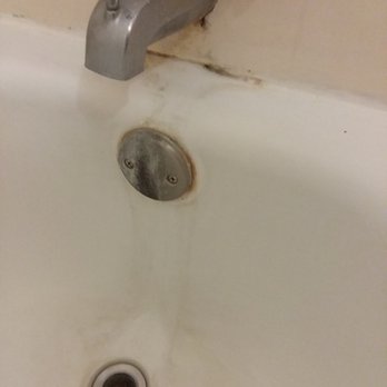 Rodeway Inn - Black mold and stains in bathtub. - Hotels Near Me - Ogallala, Nebraska Rodeway Inn - Black mold and stains in bathtub. - Hotels Near Me - Ogallala, Nebraska