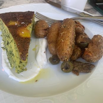 Dagon - Zucchini Frittata w/ labneh and crispy zaatar potatoes. - Bars Near Me - New York, New York
