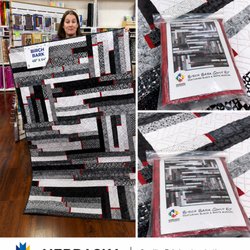 Birch Bark Quilt Kit featuring modern black, white, and red quilt patterns available at Nebraska Quilt Company in Fremont, Ne...