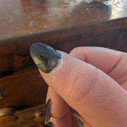 Young's Nail Salon - The color came up because I had to glue the nail down and file it and the color came up. It's only been a week since I got the manicure and