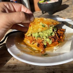 El Sabroso Taco Shop - Mulita adobada with everything (white & yellow cheese, mashed avocado, onion, and cilantro)