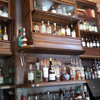 Bar a Vin - bottles of alcohol on shelves - Wine Bars Near Me - Washington, DC, District of Columbia