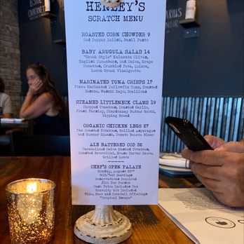 Henley's Village Tavern - a menu on a table - Gastropubs Near Me - Brightwaters, New York
