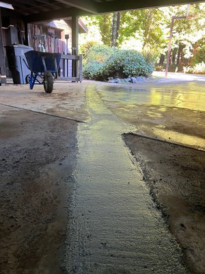 sewer line patch - This sewer line extended through a carport area.