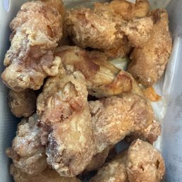 Chicken with seasoning sprinkled on top. Chicken with seasoning sprinkled on top.