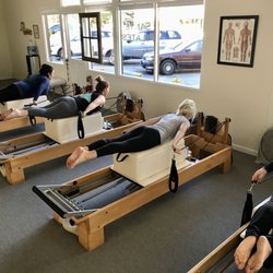 Sante Pilates Studio - Prone arm and back work on the reformer