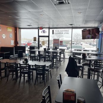 The Growler Guys - Looking from inside to the front entrance. - Beer Bar Near Me - Eau Claire, Wisconsin The Growler Guys - Looking from inside to the front entrance. - Beer Bar Near Me - Eau Claire, Wisconsin