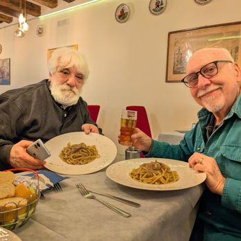 Osteria Da Toni - Old friends enjoying Bigoli in Salsa. - Italian Near Me - Venezia, VE