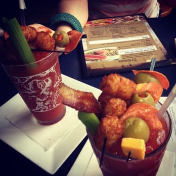 Tick Tock Lounge - Crazy Bloody Marys with house bacon and pepper infused vodka. Bacon! Tater tots! Cheese, pepperoni and olive skewer! Celery! - Lounges Near Me - Indianapolis, Indiana Tick Tock Lounge - Crazy Bloody Marys with house bacon and pepper infused vodka. Bacon! Tater tots! Cheese, pepperoni and olive skewer! Celery! - Lounges Near Me - Indianapolis, Indiana