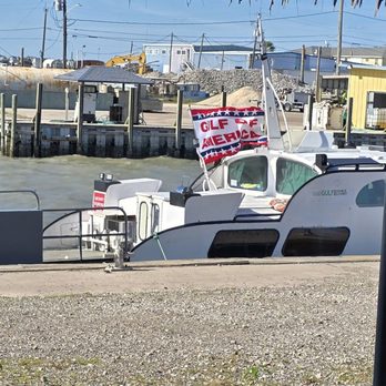 TopWater Grill - Boat with a flag advertising Gulf of America - Seafood Near Me - San Leon, Texas TopWater Grill - Boat with a flag advertising Gulf of America - Seafood Near Me - San Leon, Texas