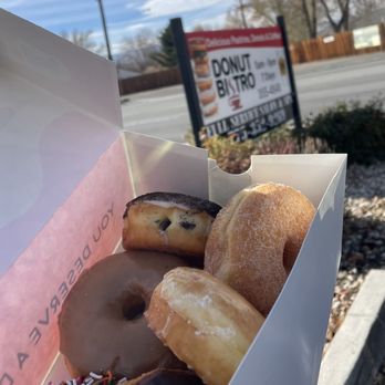 Donut Bistro - 6 pack of donuts and "Donut Bistro" sign - Donuts Near Me - Sparks, Nevada